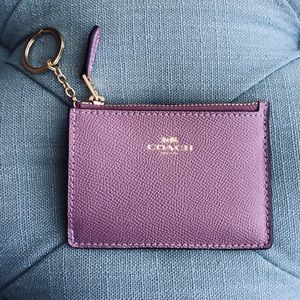 Coach card and money holder wallet.